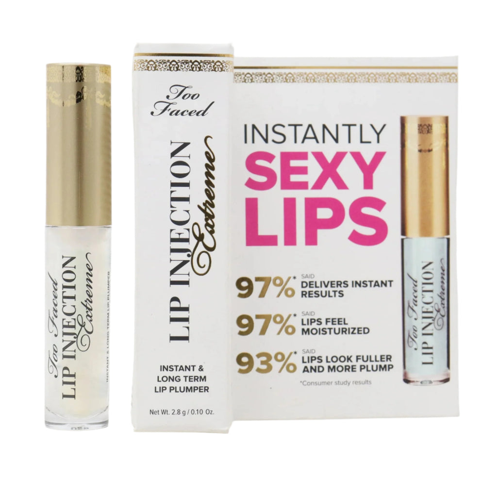 Too Faced Lip Injection Extreme product line including a tube of lip plumper, its packaging box, and a fan brush, with branding and product information displayed.