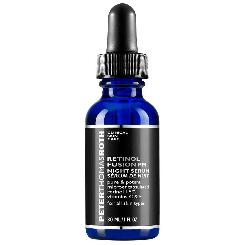 Peter Thomas Roth Retinol Fusion PM Night Serum in a 30 ml cobalt blue glass dropper bottle with a black label and black dropper cap, on a white background.