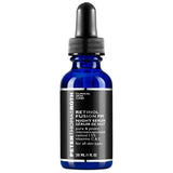 Peter Thomas Roth Retinol Fusion PM Night Serum in a 30 ml cobalt blue glass dropper bottle with a black label and black dropper cap, on a white background.